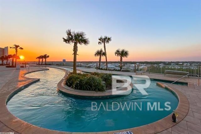 26302 Perdido Beach Blvd Unit D-704, Orange Beach, AL 36561 - community pool featuring a patio area
