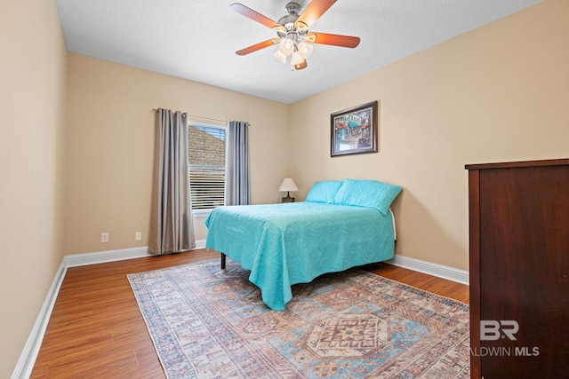 2554 Masters Ct, Mobile, AL 36618 - bedroom featuring wood finished floors and a ceiling fan
