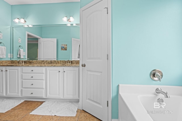 2554 Masters Ct, Mobile, AL 36618 - bathroom featuring double vanity, a bath, and tile patterned flooring