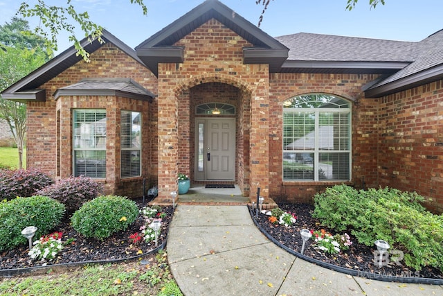 2554 Masters Ct, Mobile, AL 36618 - entrance to property featuring brick siding and roof with shingles