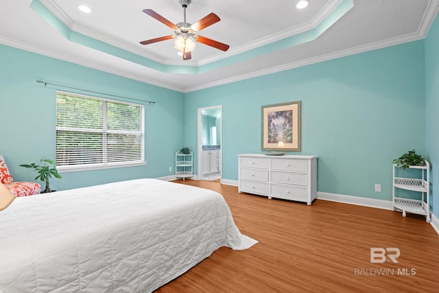 2554 Masters Ct, Mobile, AL 36618 - bedroom featuring a tray ceiling, wood finished floors, ornamental molding, recessed lighting, and a ceiling fan