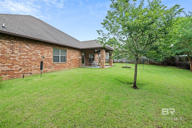 2554 Masters Ct, Mobile, AL 36618 - fenced backyard with a patio area