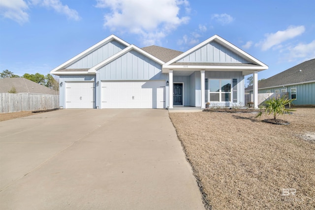 view of front of house with a garage and covered porch