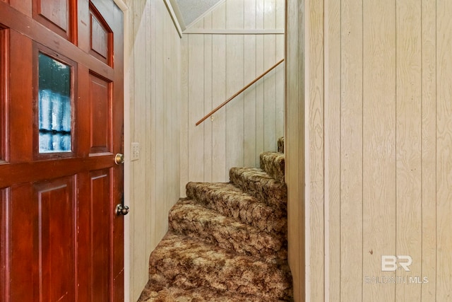 entrance foyer with wood walls