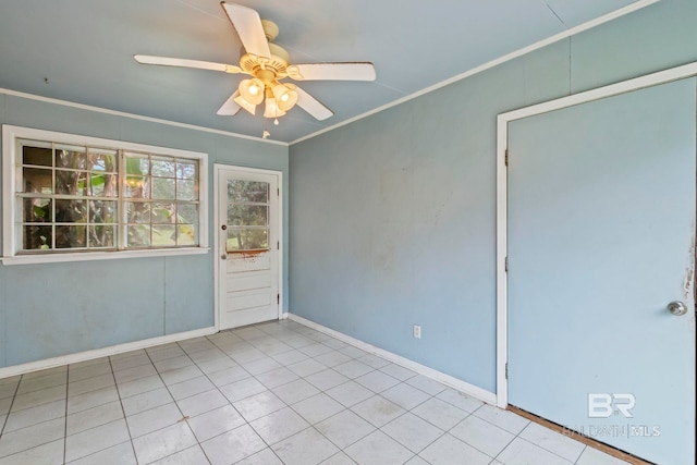 unfurnished room with ceiling fan, light tile patterned floors, and crown molding