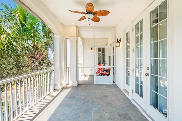 balcony featuring french doors and ceiling fan