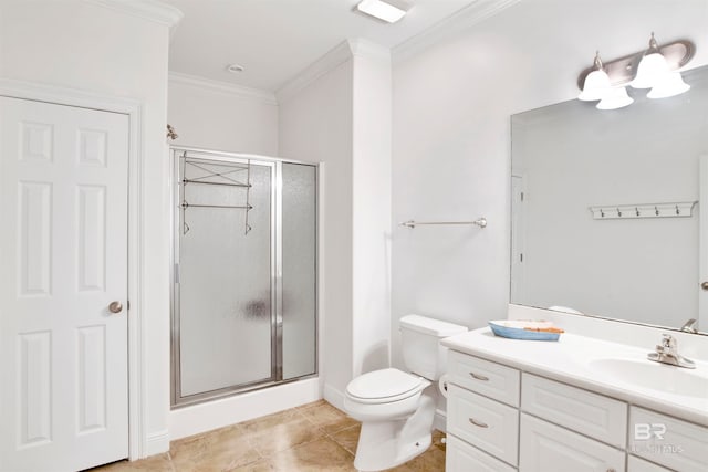 bathroom featuring a shower with shower door, toilet, tile patterned floors, vanity, and crown molding