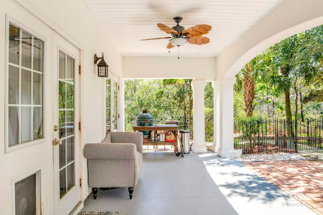 view of patio featuring ceiling fan