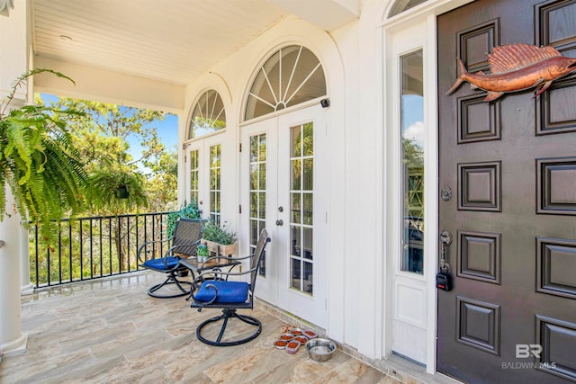 doorway to property with french doors