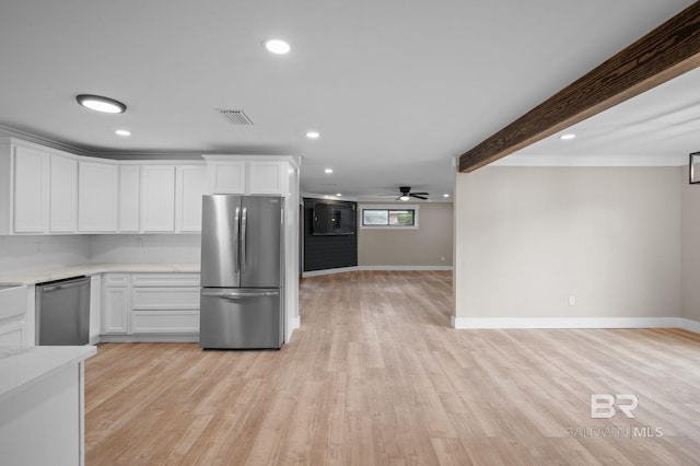 751 Abbey Way, Mobile, AL 36695 - kitchen featuring appliances with stainless steel finishes, open floor plan, baseboards, white cabinets, and a ceiling fan