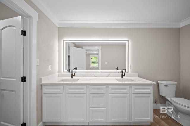 751 Abbey Way, Mobile, AL 36695 - full bathroom featuring toilet, double vanity, wood finished floors, ornamental molding, and baseboards