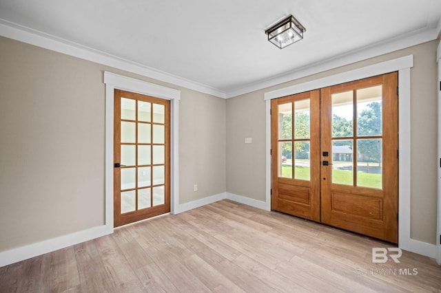 751 Abbey Way, Mobile, AL 36695 - doorway to outside with french doors, ornamental molding, light wood-type flooring, and baseboards