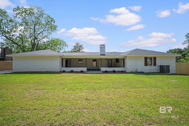 751 Abbey Way, Mobile, AL 36695 - view of front facade with brick siding, a chimney, and central air condition unit