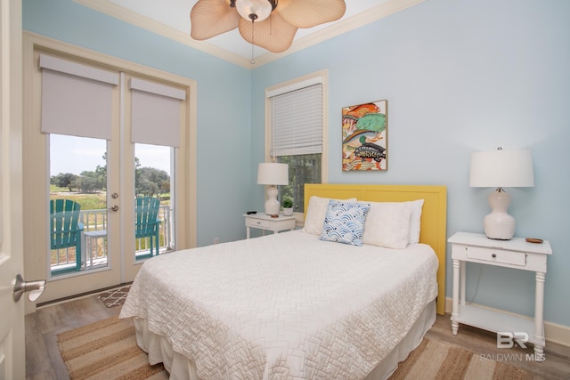 bedroom featuring ornamental molding, access to outside, wood finished floors, baseboards, and ceiling fan