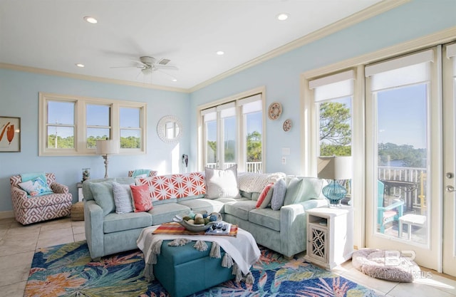 living area with light tile patterned floors, recessed lighting, ceiling fan, and ornamental molding