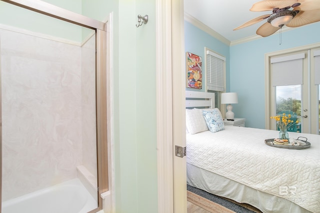 bedroom featuring crown molding and ceiling fan