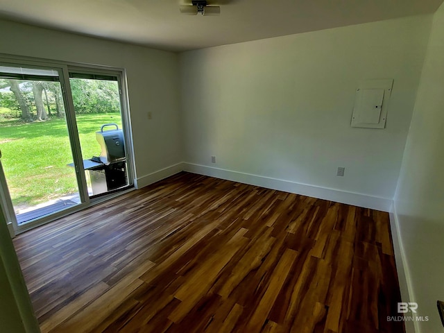 24663 Chestnut St Unit A & B, Elberta, AL 36530 - unfurnished room with baseboards, dark wood finished floors, and electric panel