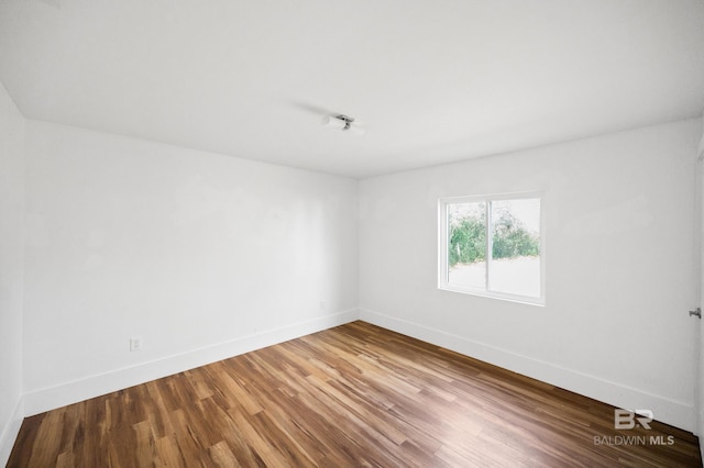 24663 Chestnut St Unit A & B, Elberta, AL 36530 - empty room featuring baseboards and wood finished floors
