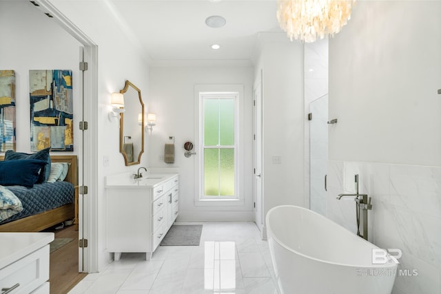 full bathroom with a soaking tub, ensuite bathroom, vanity, a notable chandelier, and recessed lighting