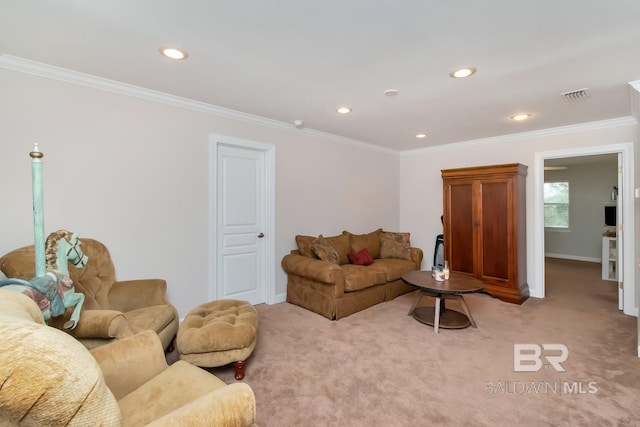 carpeted living room with ornamental molding