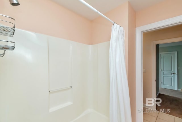 bathroom with tile patterned flooring