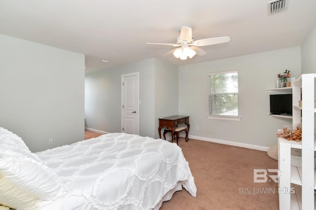 bedroom featuring light carpet and ceiling fan