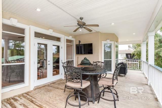 wooden terrace with french doors and ceiling fan