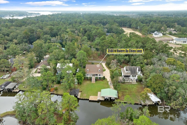 birds eye view of property featuring a water view