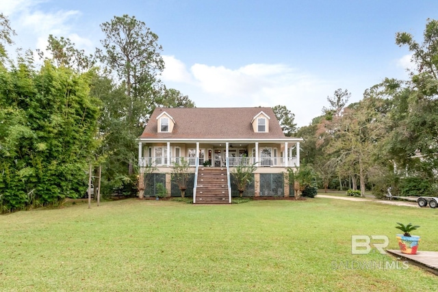 view of front facade featuring a front yard and covered porch