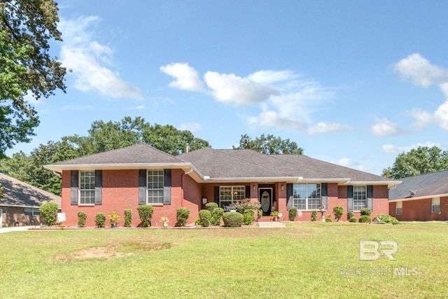 ranch-style home with a front lawn