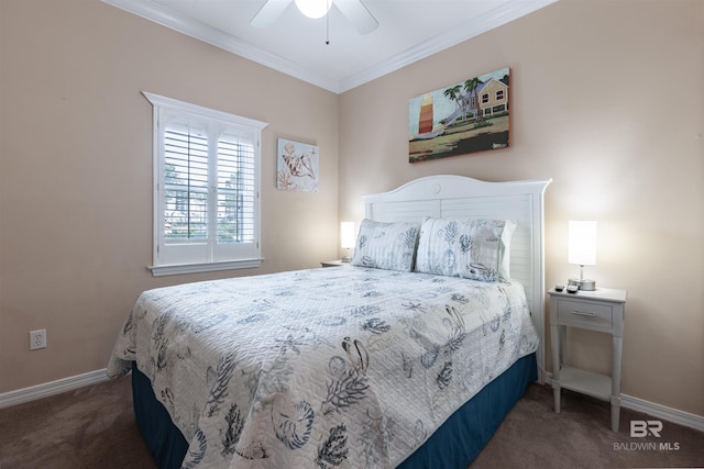 carpeted bedroom with ceiling fan, baseboards, and ornamental molding