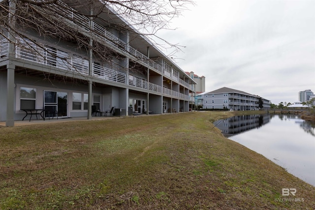 view of property with a water view