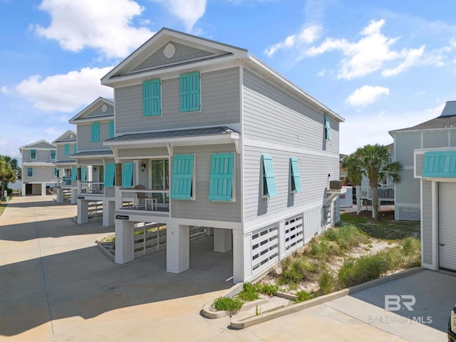 view of front of home with a carport