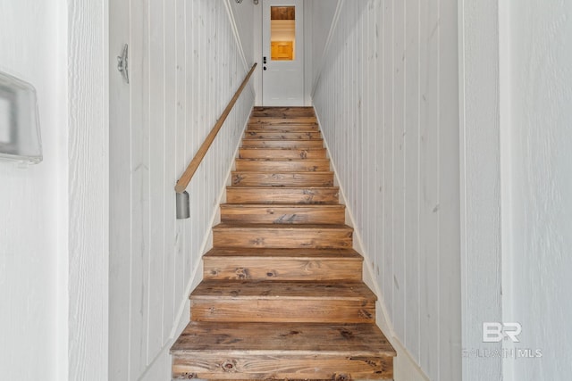 stairway with wood-type flooring