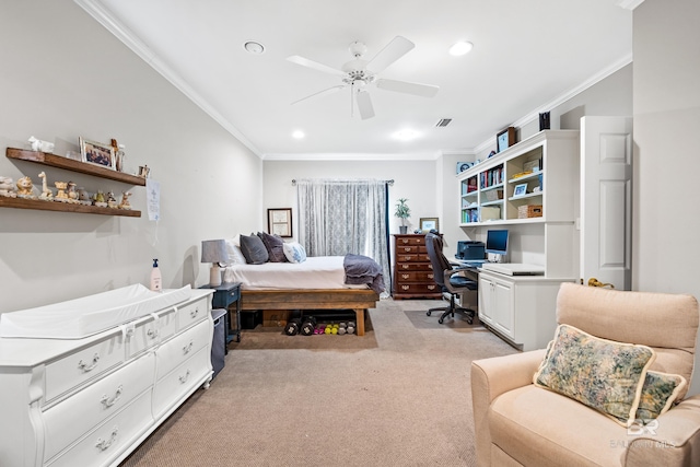 bedroom with ornamental molding, light colored carpet, and ceiling fan