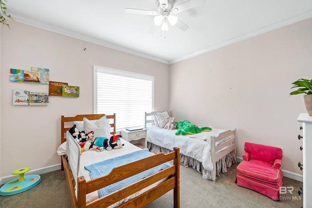 carpeted bedroom featuring ceiling fan and crown molding