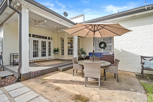 view of patio featuring french doors and ceiling fan