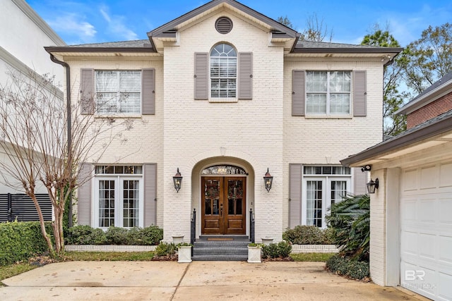 view of front facade featuring french doors