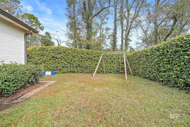 view of yard featuring a playground