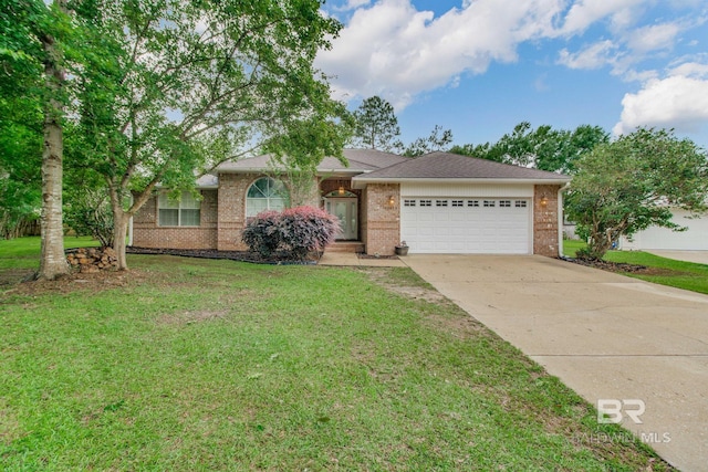 10675 Aloe Ln, Lillian, AL 36549 - ranch-style house with brick siding, an attached garage, concrete driveway, and a front yard