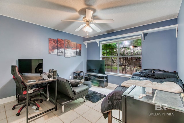 10675 Aloe Ln, Lillian, AL 36549 - tiled bedroom featuring baseboards, a desk, a ceiling fan, and a textured ceiling
