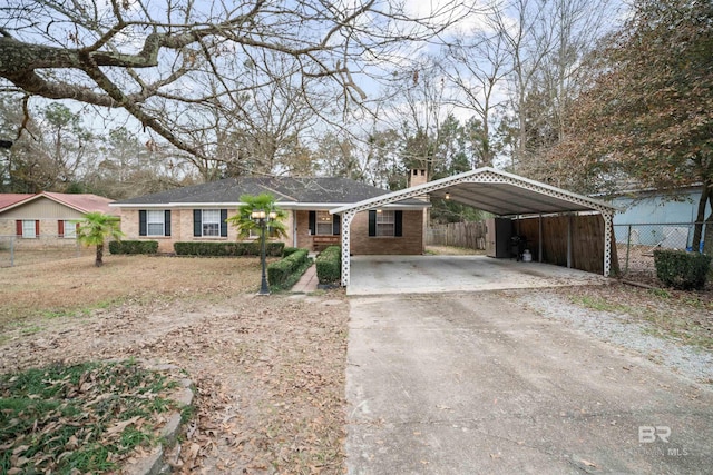 single story home featuring a carport