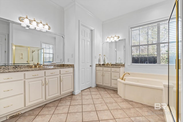 full bath featuring two vanities, a stall shower, crown molding, a bath, and tile patterned floors