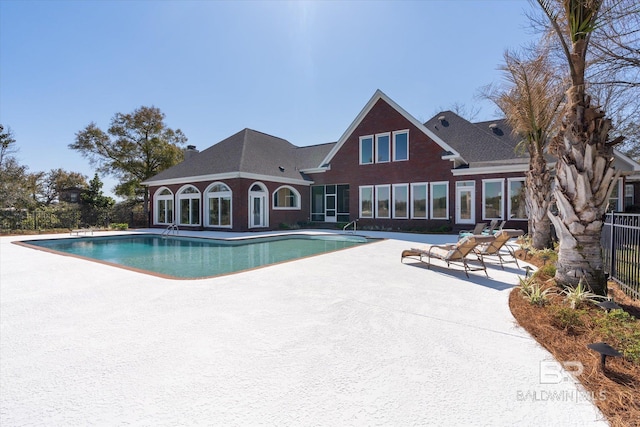 view of pool featuring a fenced in pool, a patio, and fence