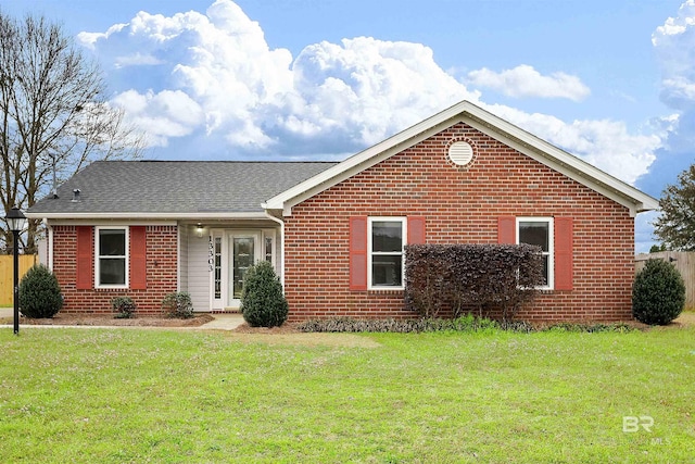 view of front of home with a front lawn