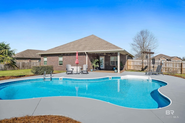 view of pool featuring a fenced in pool, a patio, and a fenced backyard