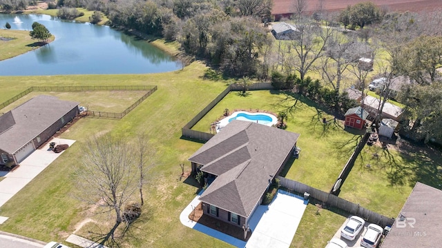 birds eye view of property featuring a water view