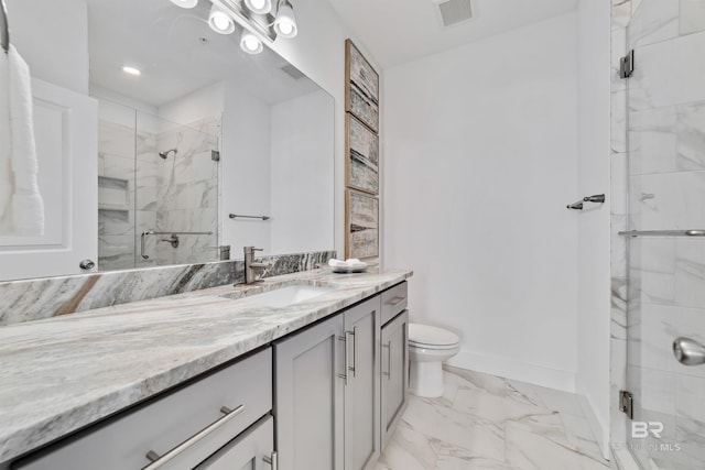 bathroom with toilet, vanity, a shower with shower door, and tile flooring