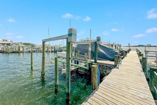 dock area featuring a water view