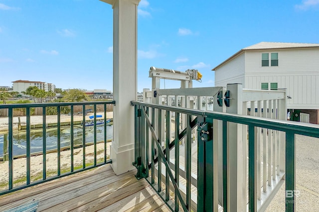 balcony featuring a water view